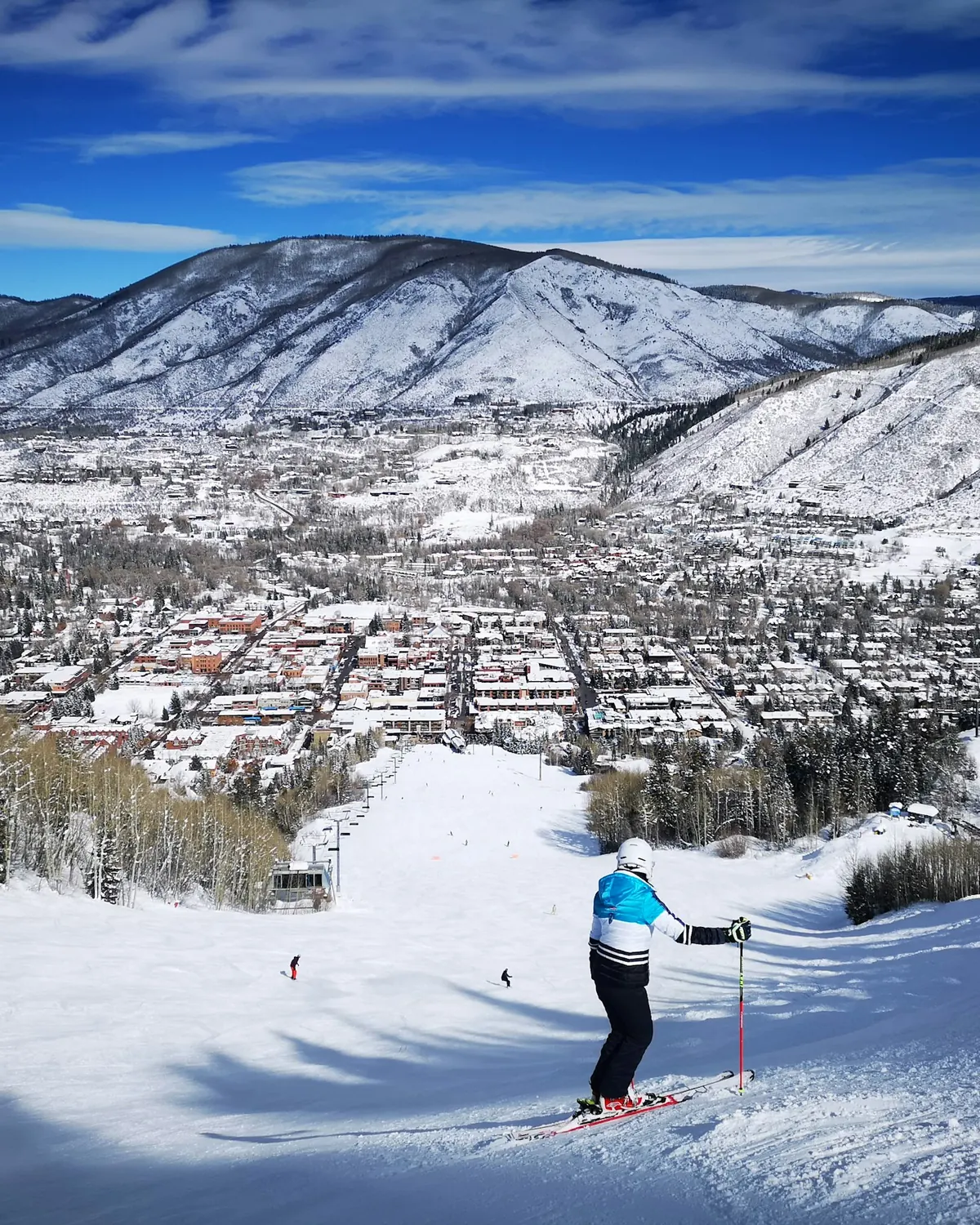 Skier above Aspen on a clear day