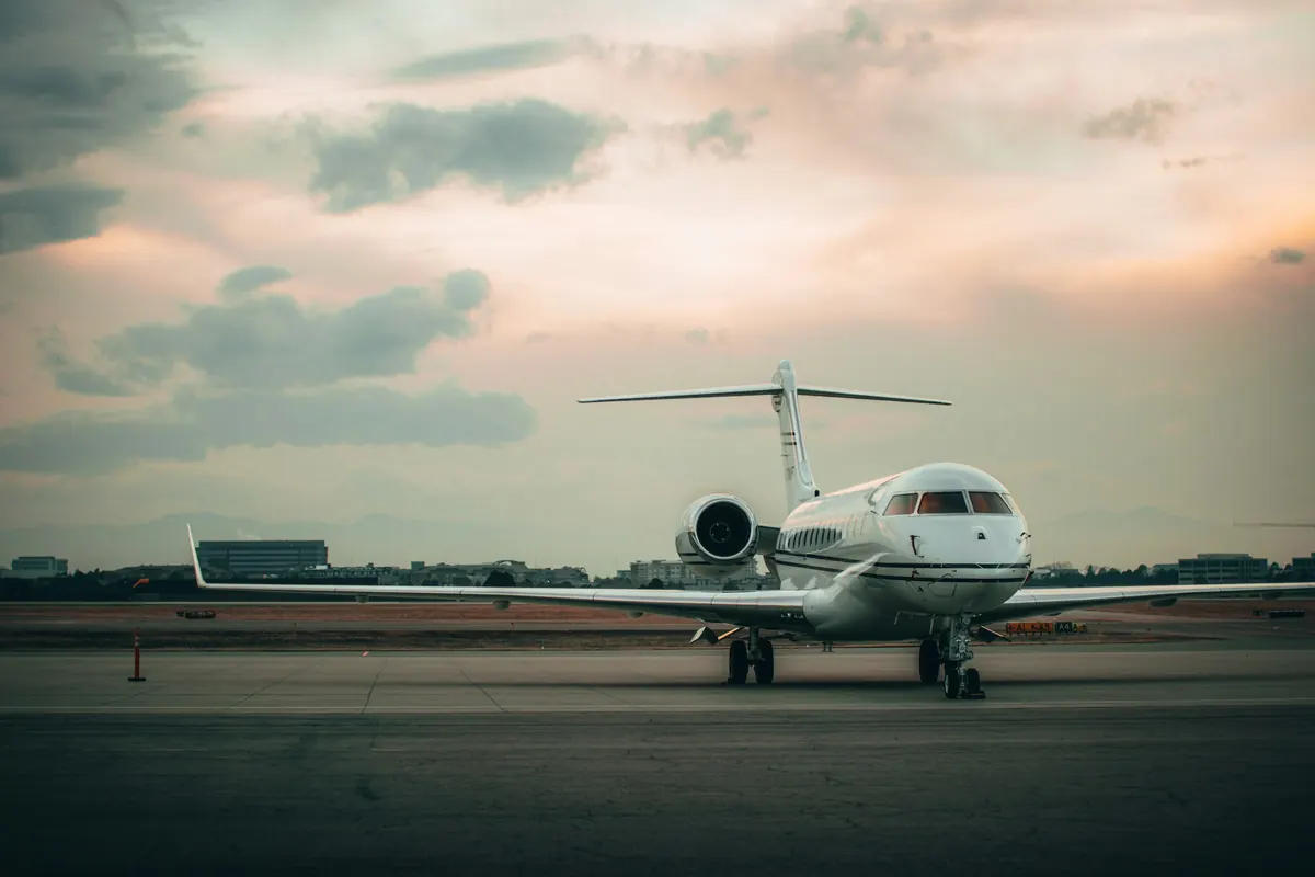 Private jet on the ramp at dusk